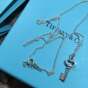 Tiffany & co. Key pendant on .925 Tiffany chain